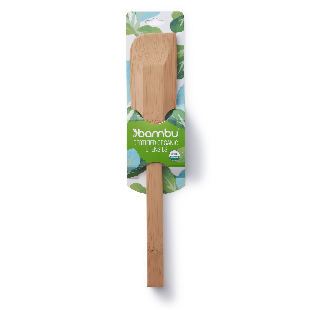 A Bamboo Scraping Spatula is sold in a blue patterned cardstock packaging.