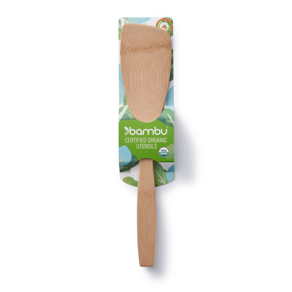 A bamboo spatula designed for left handed cooks is pictured in the packaging card.