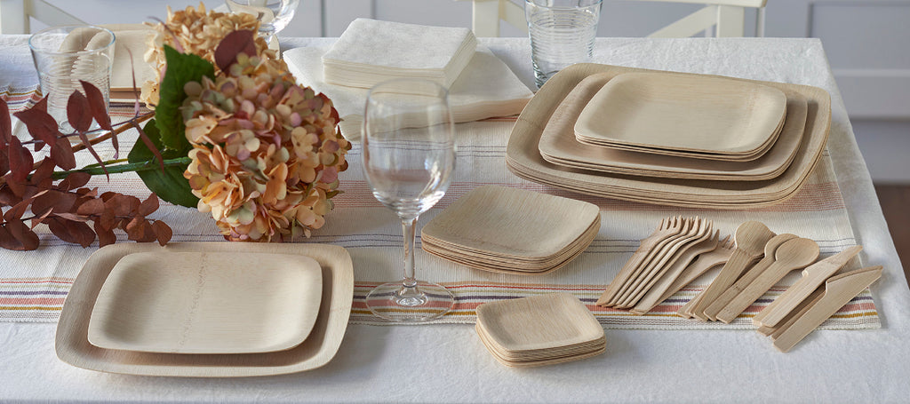 Bamboo plates stacked on a tabletop