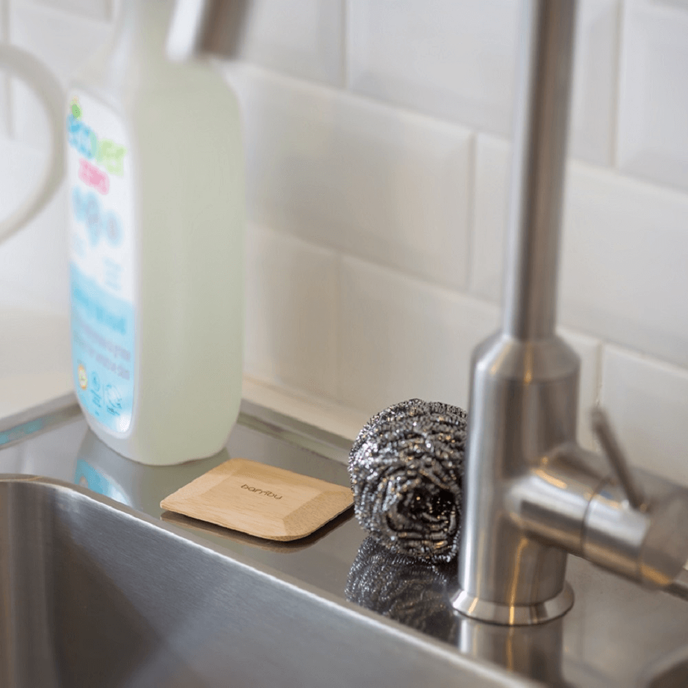 bamboo pot scraper at kitchen sink