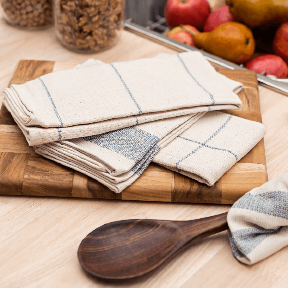 Meema Dishtowels have a subtle blue stripe pattern.